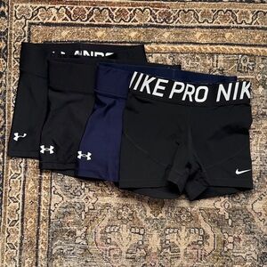 Nike Dri-FIT and Under Armor Black Performance Compression Shorts for Volleyball